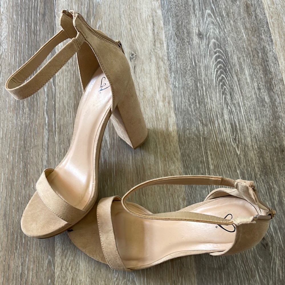 size nine, tan heels, wore once